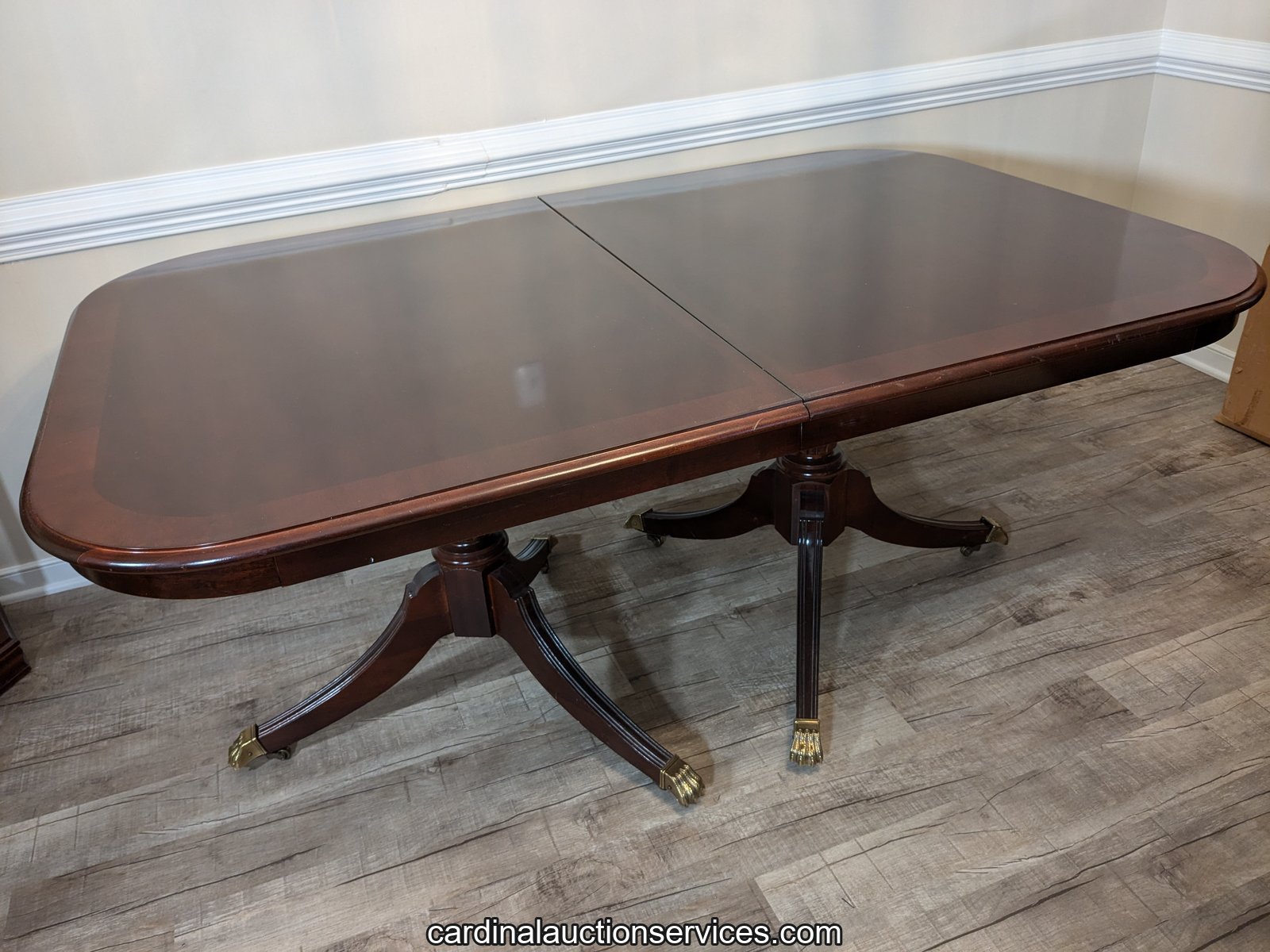Double-pedestal dining table in the Short Pump online estate auction