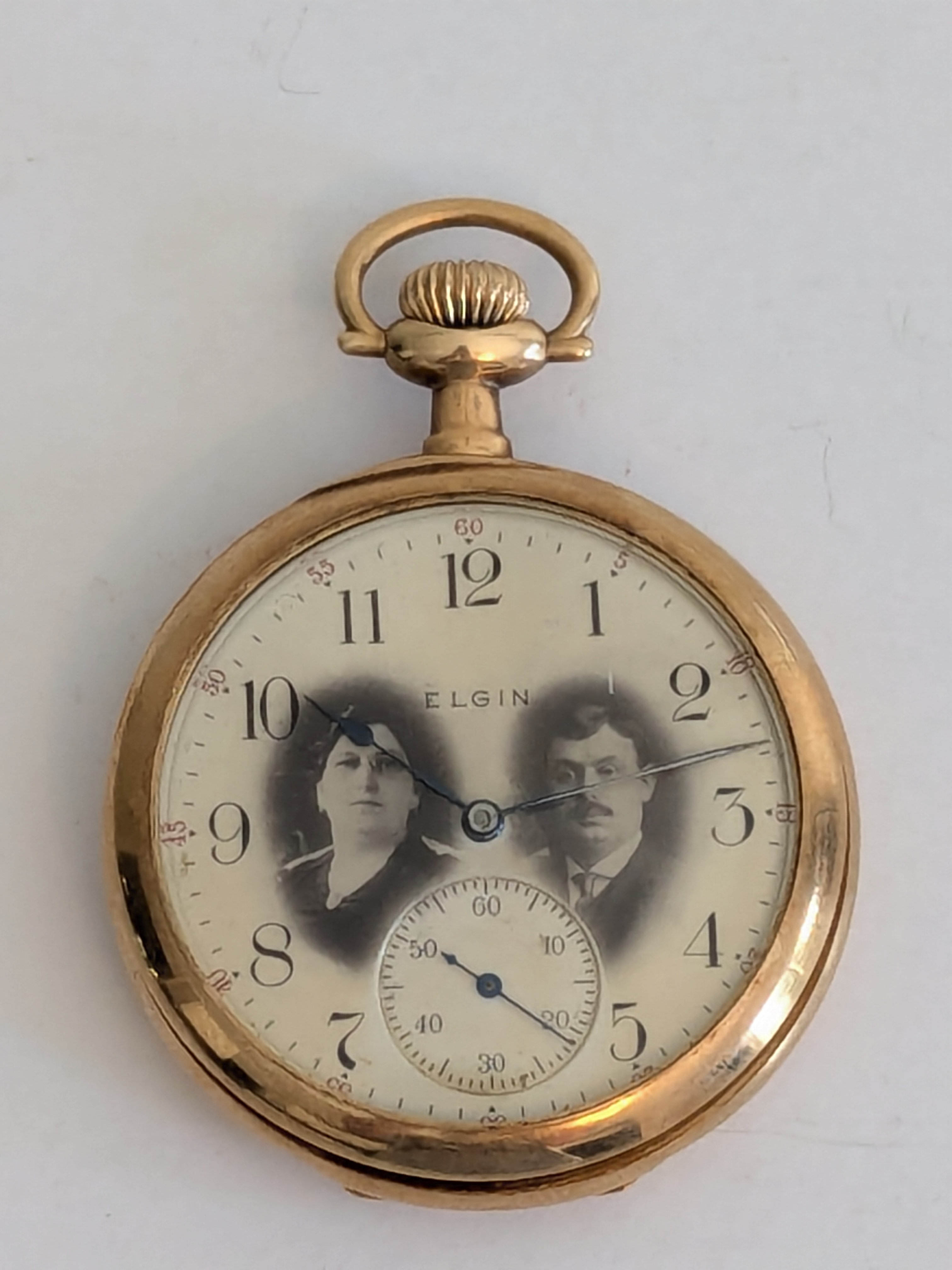 Elgin pocket watch in a 14K gold case with an enamel portrait dial, top lot of the Short Pump online estate auction