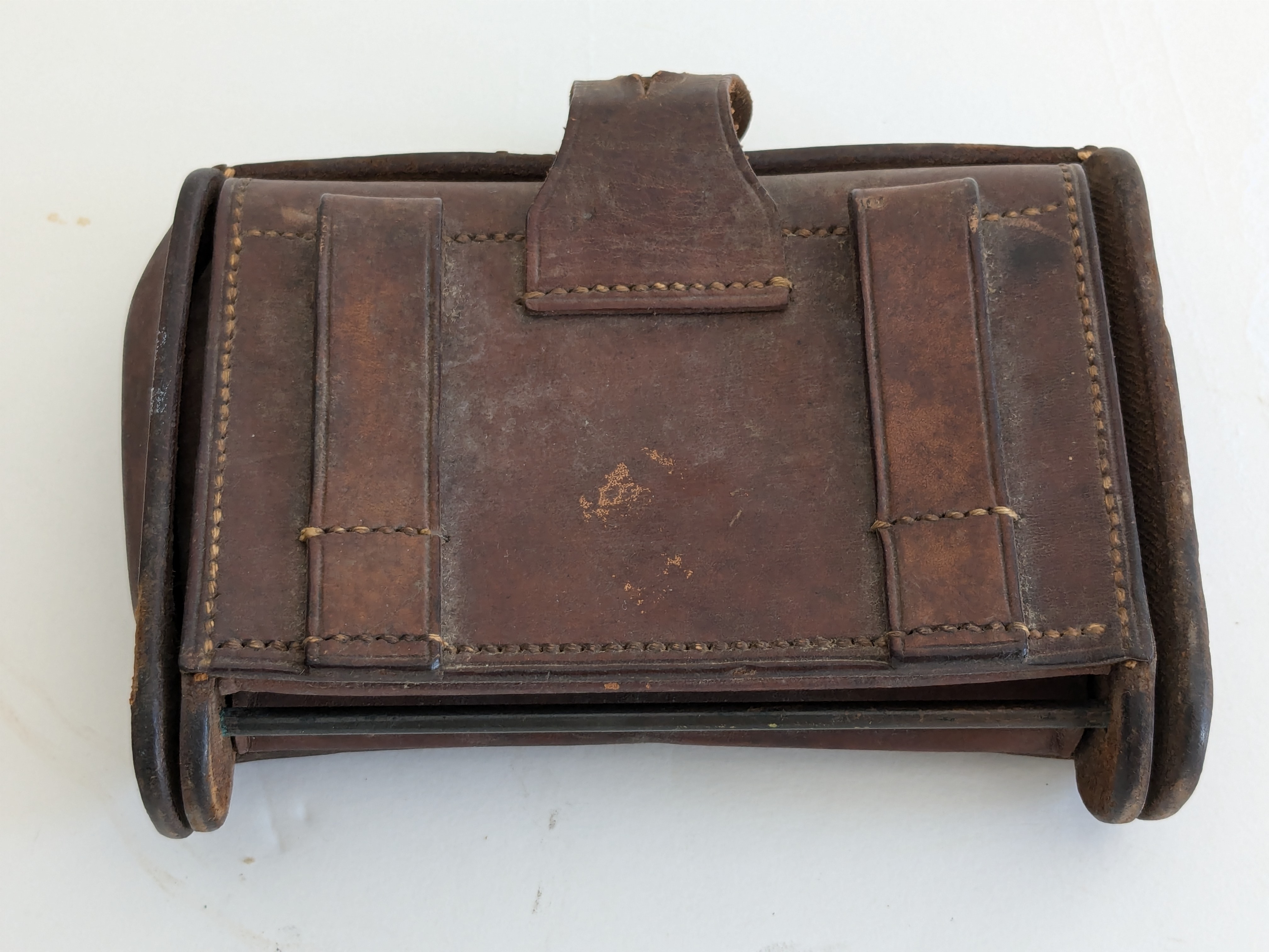 Back of a McKeever cartridge box showing two leather belt loops