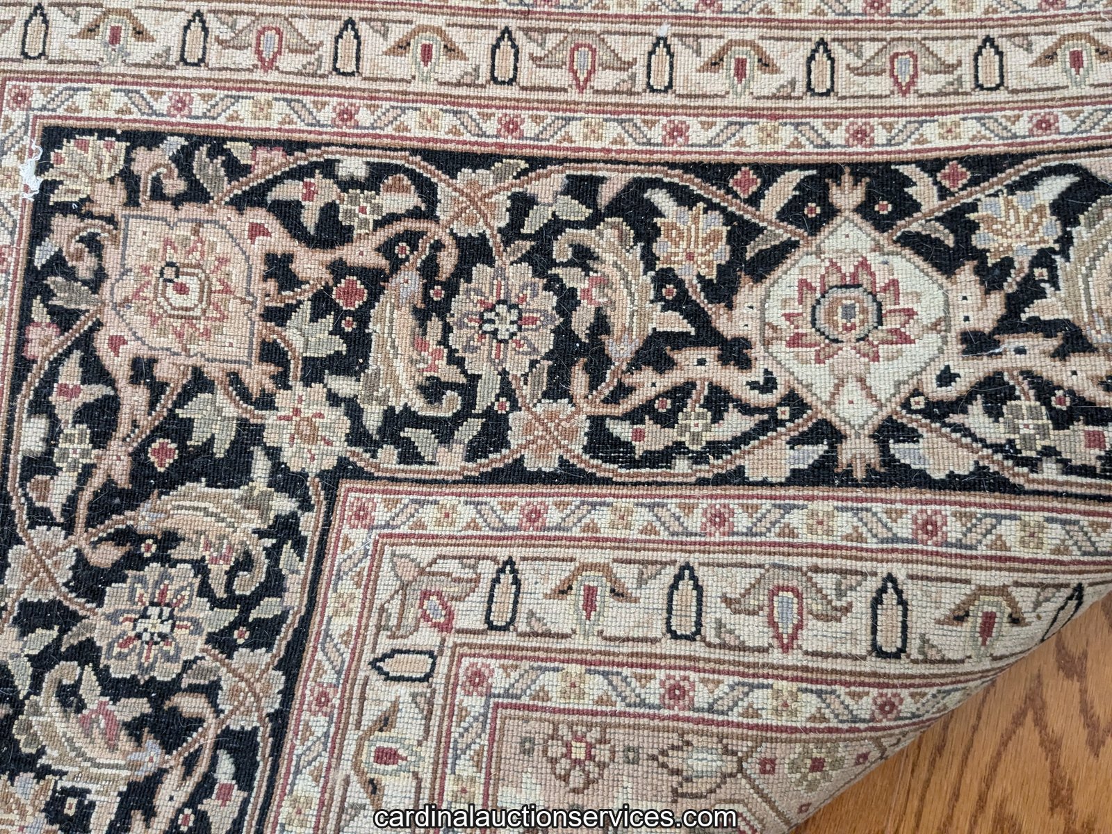 Hand-knotted Tabriz rug, Lot 303, corner flipped to show the knotted back, Barrington estate sale