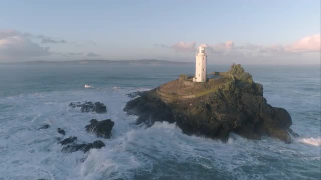 Aerial Godrevy Lighthouse morning reflection Cornwall, UK