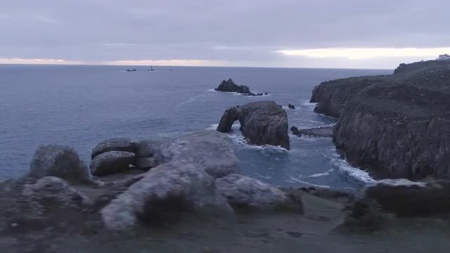 Land's End Sunset on a moody evening in Cornwall, UK 