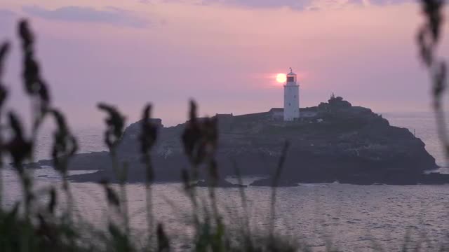 Beautiful sunset  at Godrevy Lighthouse, Cornwall, UK