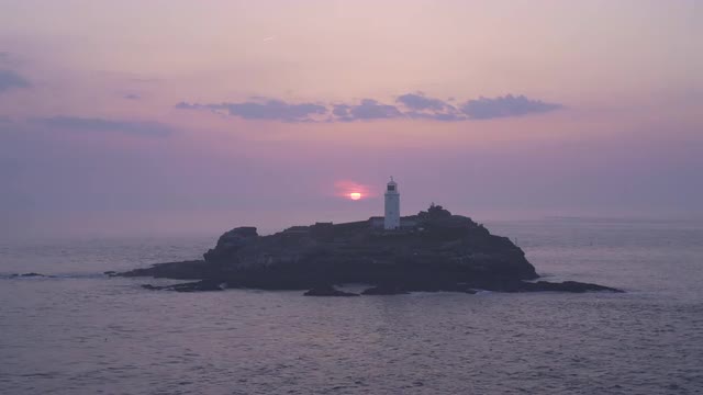Beautiful sunset  at Godrevy Lighthouse, Cornwall, UK