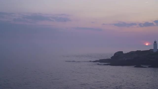 Beautiful sunset  at Godrevy Lighthouse, Cornwall, UK