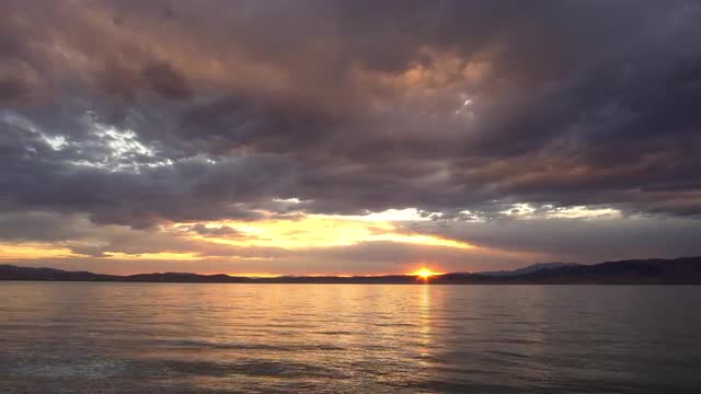 Colorful sunset reflecting in Utah Lake