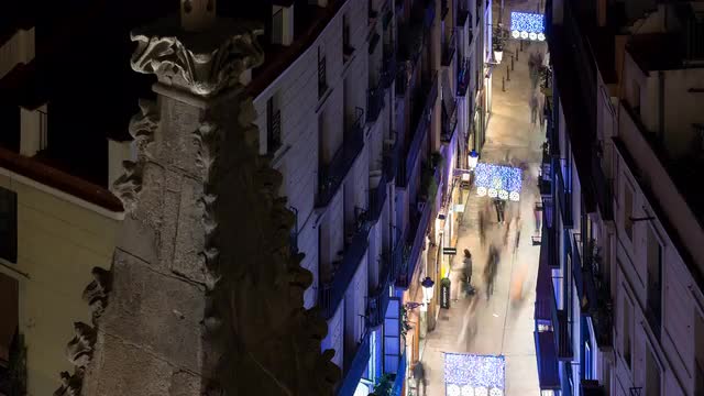 People passing by l'Argenteria street in Barcelona