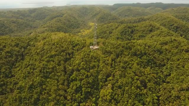 Telephone signal tower in mountains.