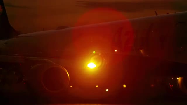 Taxiing plane at night at the Jacarepagua Airport in Brazil