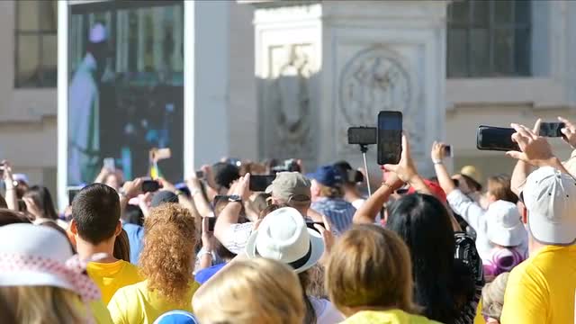 Slow motion of Pope Francis at St Peter's square on screen display