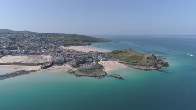 4K Aerial footage of St Ives harbour on a beautiful sunny day in June 2018