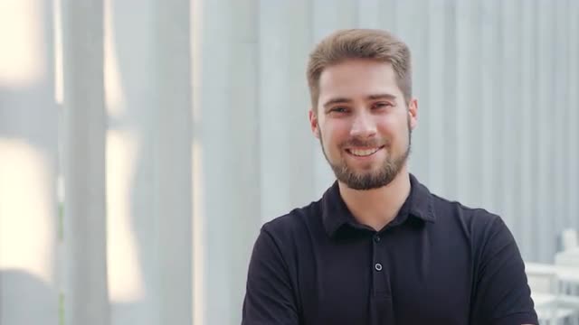 Happy Man with Beard against a White Background