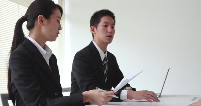 Japanese businesspeople in a meeting