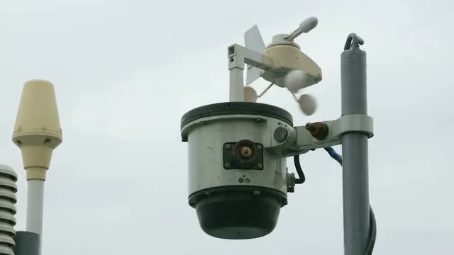Marine weather vane rotates in direction of wind