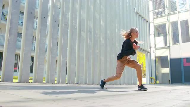 Girl Performs Modern Hip Hop Dance on the Streets