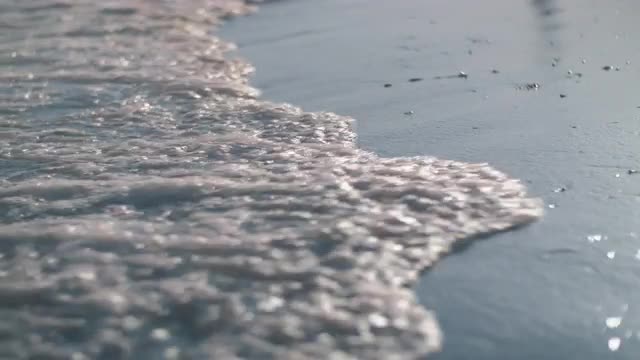 Sea waves washing the shore