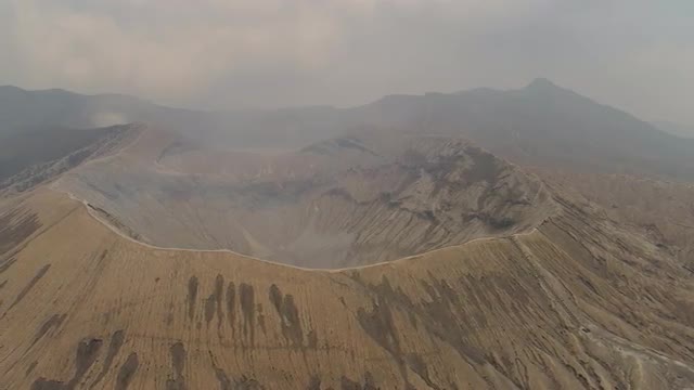 mountain landscape with an active volcano