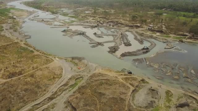 Cleaning and deepening by dredger onriver. java, indonesia
