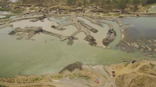 Cleaning and deepening by dredger onriver. java, indonesia