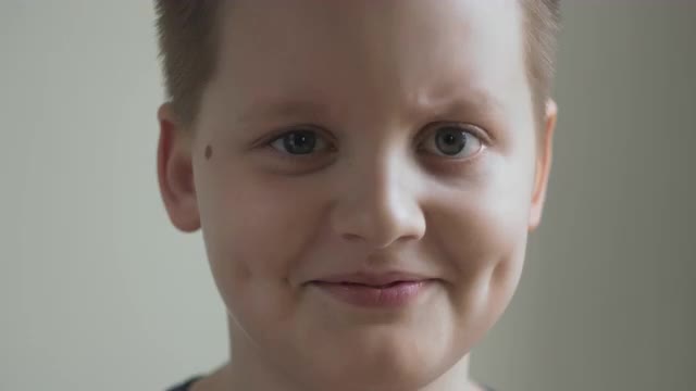 Cinemagraph Portrait Of Handsome Expressive Little Boy Moving His Eyebrow