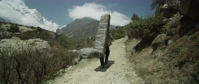 A Porter Carrying Supplies in the Himalayas