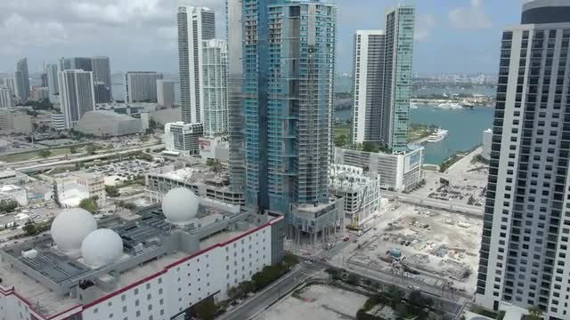 4K Aerial - Paramount World Center in development (tilt up)