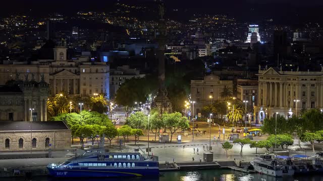 The rambles, the statue of Colon and some buildings at night