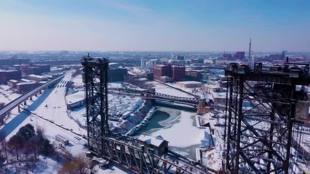 Flying toward old bridge on the south side of Chicago