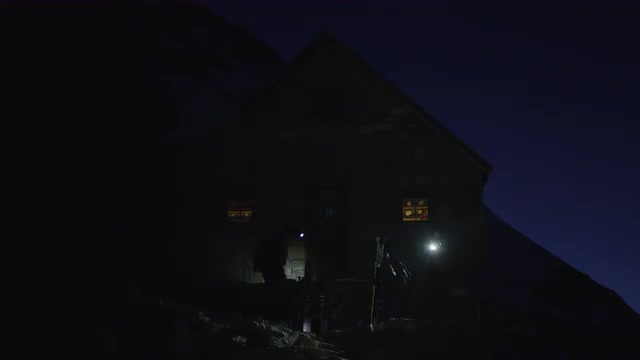 Hikers Leaving a Cabin at Night in Banff by Headlamp