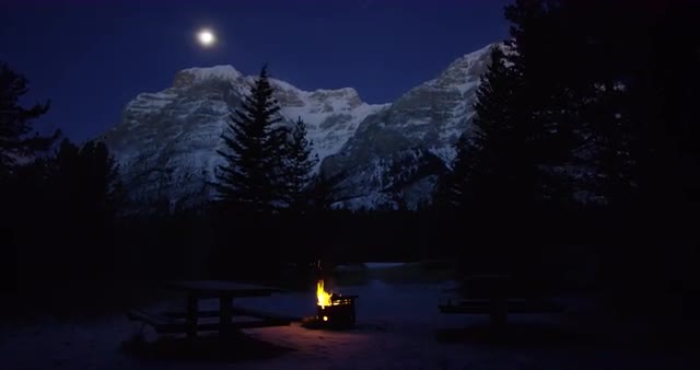 Push Towards a Campfire with a Beautiful Mountain Range in Banff