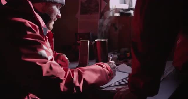 Two Men Looking Planning Routes in Banff