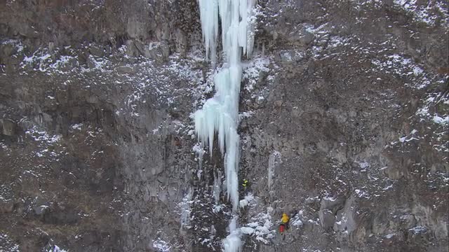 Aerial Shot of Ice Climbers on the Side of a Mountain