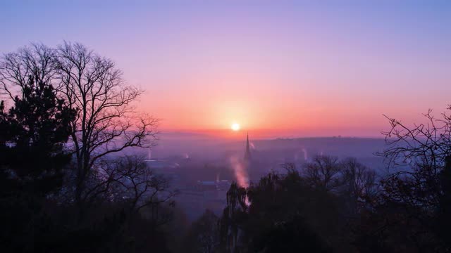 Winter sunrise time lapse in inner city park