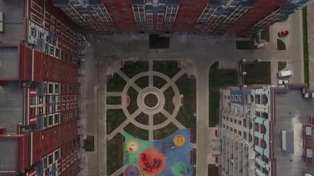 Flying over apartments blocks with inner court in New Moscow, Russia