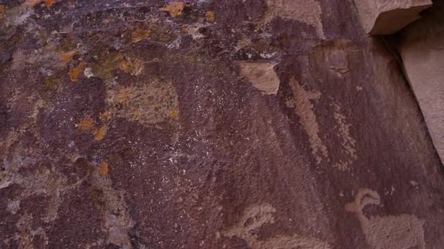 Petroglyphs in Nine Mile Canyon carved in cliff