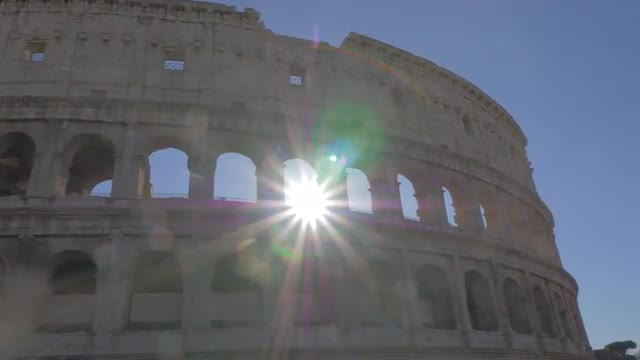 Roman Coliseum ruins in bright sunrays