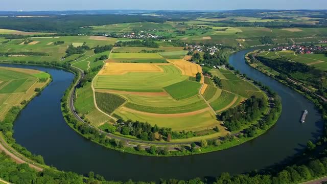 River curving round farm fields.