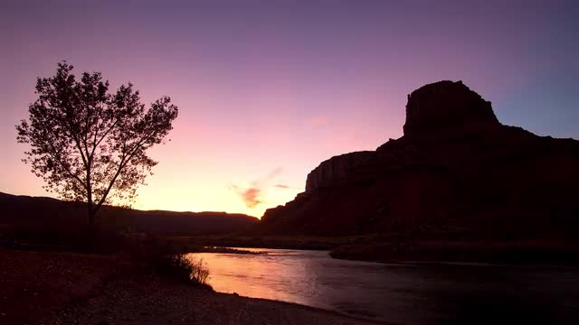 Timelapse looking over the Colorado River during colorful sunset