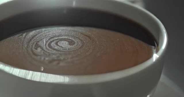 Slow Motion Coffee Cup Macro Sun Swirl