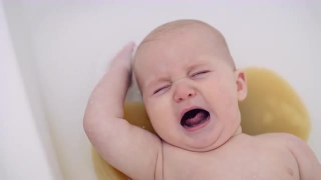 6 Month Baby boy slowly breaks down and cries during bath in slow motion 8K