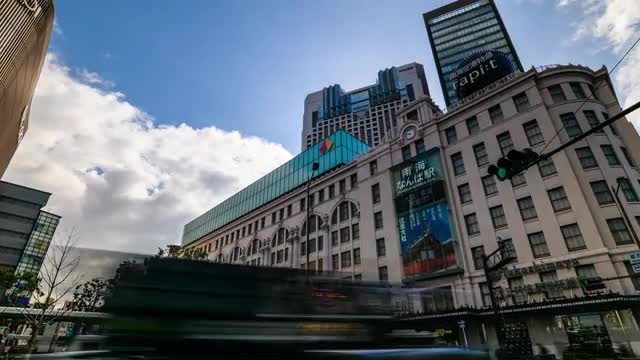 OSAKA, JAPAN - FEB 19 2020: Exterior time-lapse view of Nansai-Namba station in Osaka, Japan.