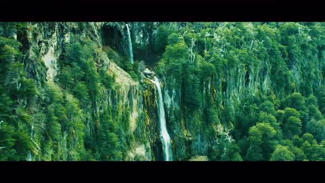 Aerial reveal of a waterfall in the Chilean Mountains