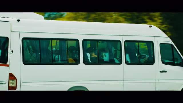 Tracking Shot of a Bus Moving Across Chilean Highway