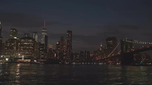 Beautiful Night Pan of Brooklyn Bridge and East River