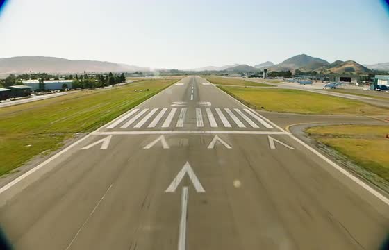 Wide shot of final approach to the airport runway