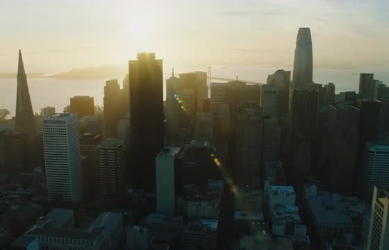 Wide aerial shot of downtown San Francisco at sunrise
