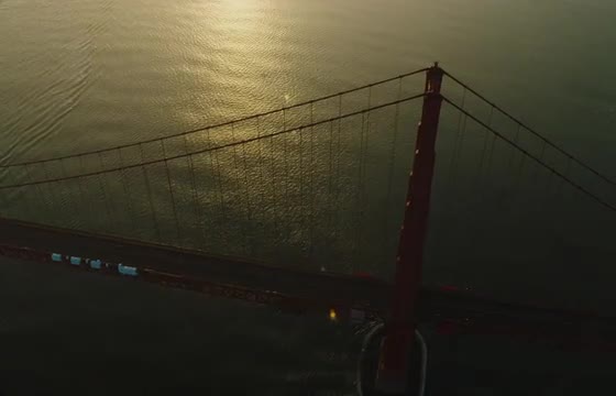 Wide aerial shot of golden gate bridge at sunrise