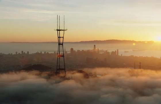 Aerial shot of Sutro Tower and San Francisco skyline at sunrise