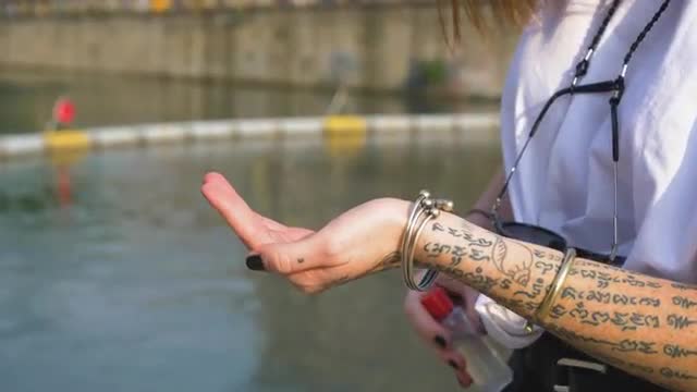 Woman disinfecting hands
