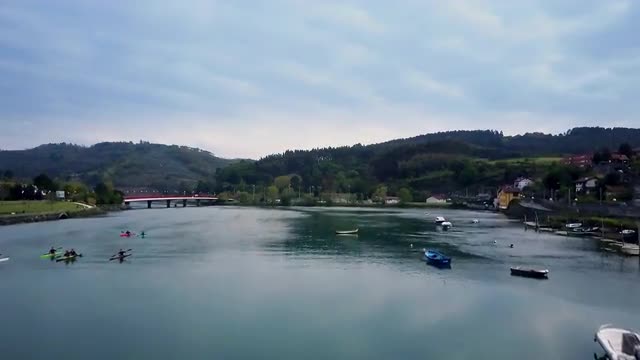 Paddle Surfers at the statuary river from Bilbao